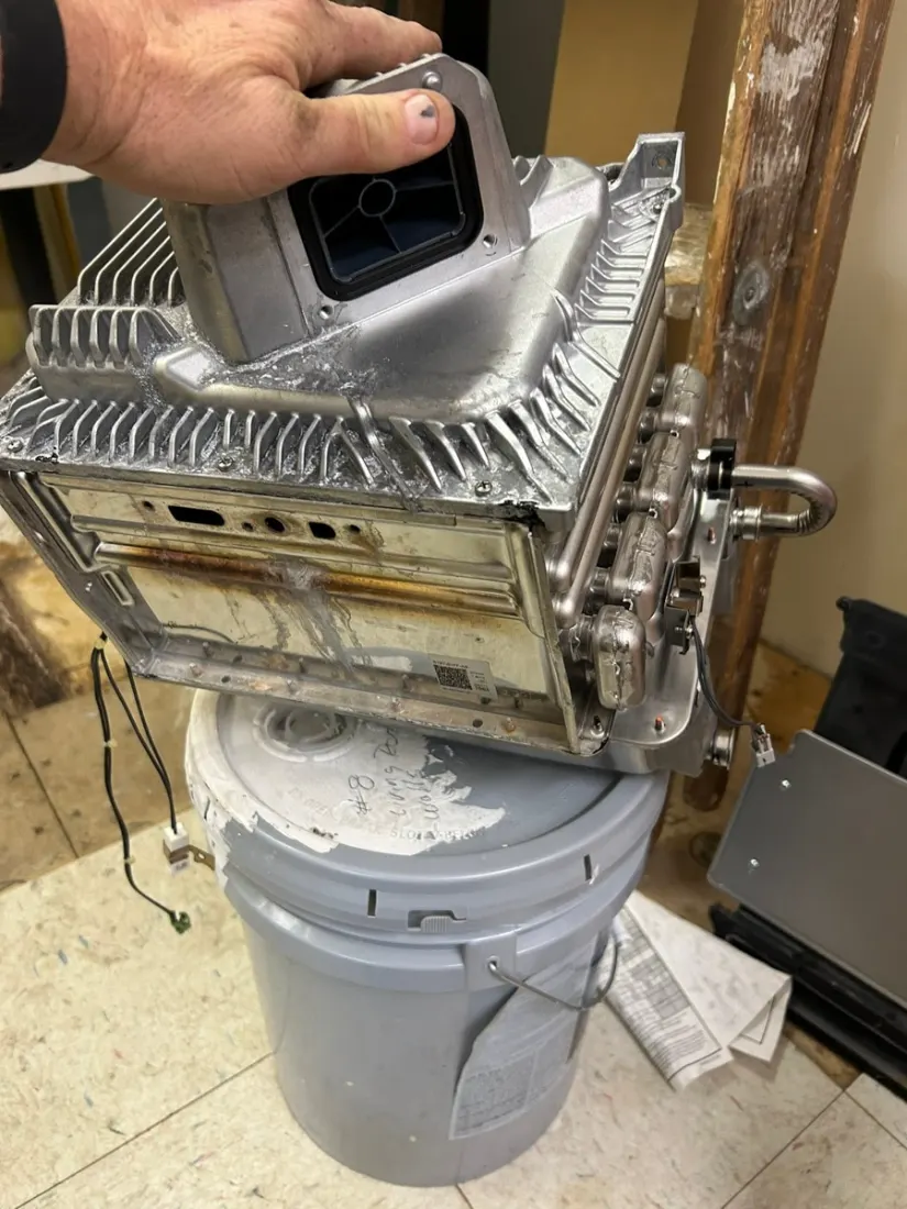Changing a furnace filter during a seasonal HVAC tune-up in New Paris, OH